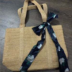 Chic Tan and Black Tote with Floral Accent